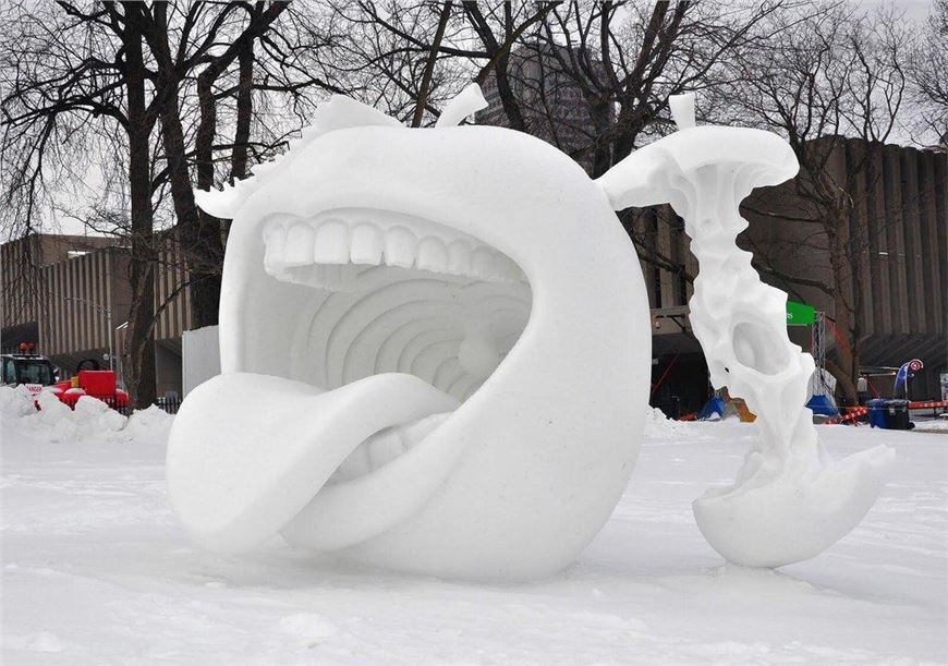 Does this amazing snow sculpture in Quebec City make you want to take a running dive right into that mouth?