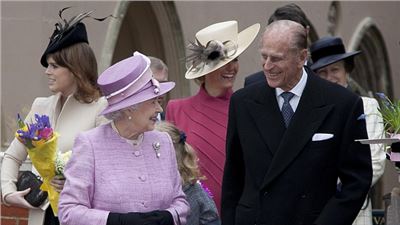 Granny's girls: Princess Eugenie and little Lady Louise join the Queen for Easter Sunday church service 