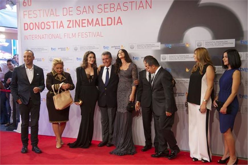 Lovely in lace: Monica Bellucci shows off her  curves at the red carpet in San Sebastian. 