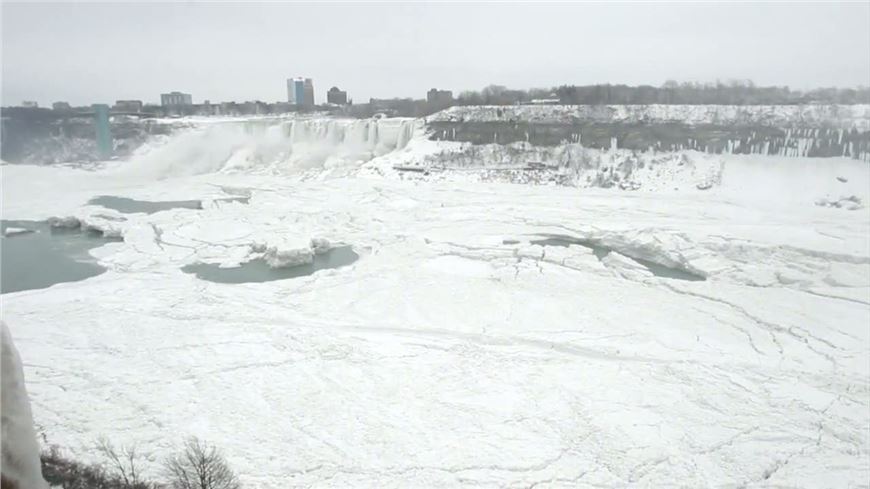 Water still cascades over nearly frozen Niagara Falls